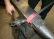 Jason Balchin forming the wrap detail in the Ironart workshops, Bath