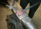 Jason Balchin forming the wrap detail in the Ironart workshops, Bath