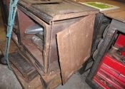 Image showing broken side plates of the cast iron stove.