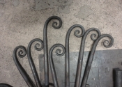 Cecilie Robinson - hot forged scrolls for the Abbey Hotel, Bath - cake stands.