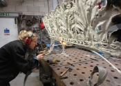 Cecilie Robinson dismantling the cast iron bench