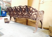 Lily of the Valley Coalbrookdale three-seat bench prior to restoration