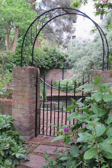 Garden Gate With Arch In Maida Vale, Metal Garden Arch With Gates